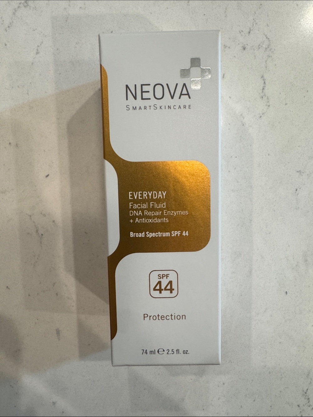 Everyday Facial Fluid SPF 44 - Gold/White